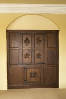 1st floor. Tower. Drawing room. Carved aumbry doors on north wall