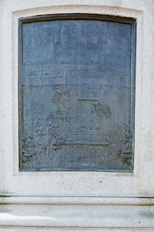 Detail of eaest facing plaque on the statue of William Gladstone.