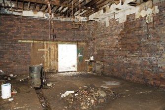 Interior. View looking back across former operations room to the main entrance on the north west wall, taken from the south east.