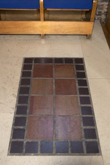 Interior. Chancel, detail of tiled floor