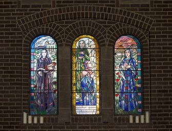 Interior. Detail of stained glass window in north transept