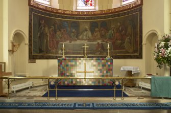 View of altar table with mural behind