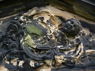 Detail of Relief showing angels, weathered, Canongate Kirk Cemetery, Edinburgh