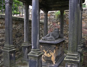 Detail of family vault, damaged, Greyfriar's Burial Ground, Edinburgh.