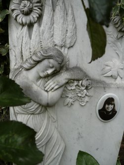 Detail of headstone with angel relief, The Grange Cemetery, Edinburgh.