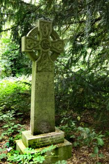 View of gravestone in style of celtic cross in memory of Louis Edward Campbell, Newington Cemetery, Edinburgh. Erected by the Libraries Committee of the Corporation of Glasgow.