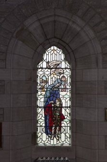 Detail of stained glass window 'I was naked and ye clothed me'