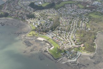 Oblique aerial view of Dalgety Bay Old harbour, taken from the NE.