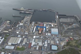 General oblique aerial view of Rosyth Dockyard centred on the Goliath Crane, looking to the SSW.