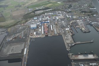 General oblique aerial view of Rosyth Dockyard centred on the Goliath Crane, looking to the NNE.