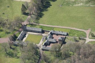 Oblique aerial view of Hardington House Stable Range, looking to the SSW.