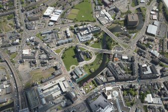 General oblique aerial view of the centre of Paisley centred on Paisley Abbey, looking to the SSE.