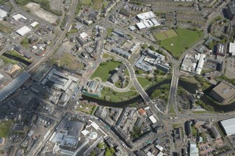General oblique aerial view of the centre of Paisley centred on Paisley Abbey, looking to the NE.