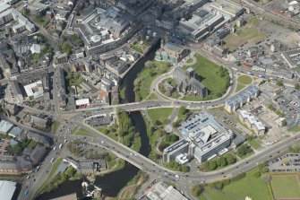 General oblique aerial view of the centre of Paisley centred on Paisley Abbey, looking to the NW.
