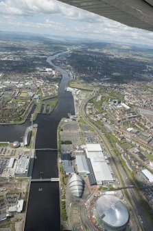 General oblique aerial view of the River Clyde centred on The Hydro, looking to the W.