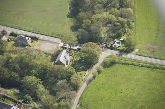 Oblique aerial view of Foveran Parish Church and Manse, looking to the E.