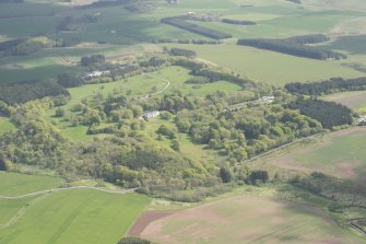 General oblique aerial view of Auchmacoy Country House, looking to the NE.