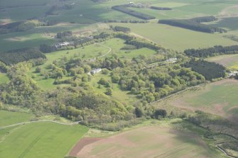 General oblique aerial view of Auchmacoy Country House, looking to the NE.