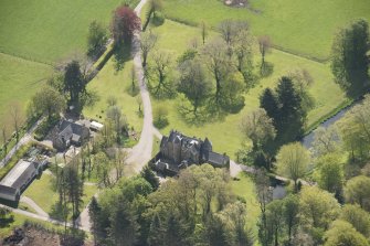 Oblique aerial view of Schivas House, looking to the SE.