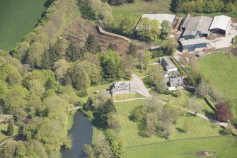Oblique aerial view of Schivas House, looking to the N.