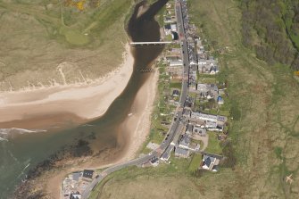 Oblique aerial view of anti tank blocks, Port Erroll, looking to the NNW.