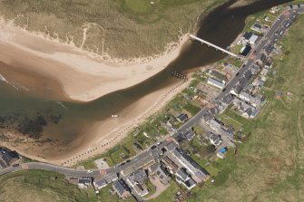 Oblique aerial view of anti tank blocks, Port Erroll, looking to the WNW.