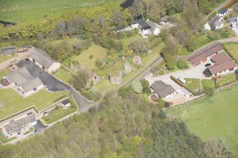 Oblique aerial view of Inverugie Castle, looking to the NW.