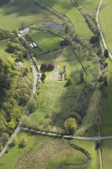 Oblique aerial view of Deer Abbey, looking to the E.