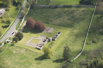 Oblique aerial view of Deer Abbey, looking to the ENE.