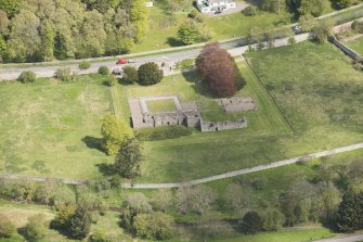 Oblique aerial view of Deer Abbey, looking to the NNE.