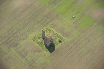 Oblique aerial view of Fedderate Castle, looking to the SW.