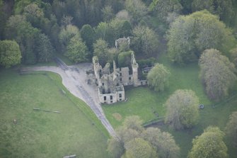 Oblique aerial view of Brucklay Castle, looking to the SE.