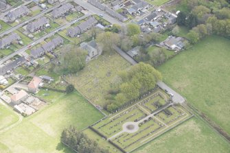 Oblique aerial view of New Pitsligo Parish Church, looking to the SE.