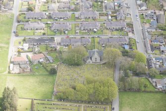 Oblique aerial view of New Pitsligo Parish Church, looking to the ENE.