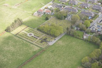 Oblique aerial view of New Pitsligo Parish Church, looking to the NE.