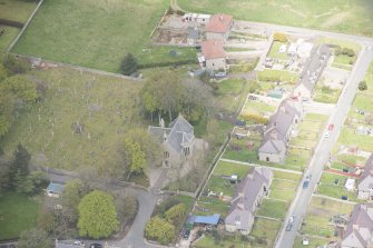 Oblique aerial view of New Pitsligo Parish Church, looking to the NNW.