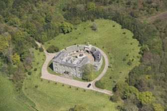 Oblique aerial view of Cairness House, looking to the N.