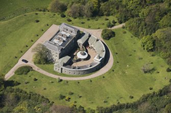 Oblique aerial view of Cairness House, looking to the W.