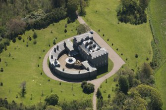 Oblique aerial view of Cairness House, looking to the SSE.