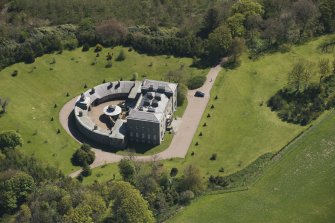 Oblique aerial view of Cairness House, looking to the ESE.