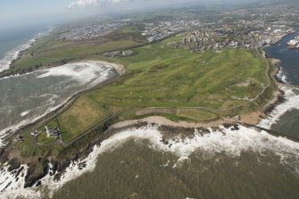 General oblique aerial view of Girdleness centred on Girdleness Lighthouse and Balnagask Golf Course, looking to the S.