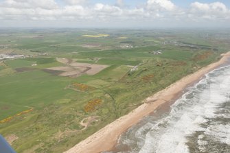 Oblique aerial view of Murcar Golf Course, looking to the NW.