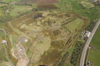 Oblique aerial view of Wester Hatton Sand and Gravel Extraction Site and land fill, looking to the NNW.