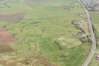 Oblique aerial view of East Abderdeenshire Golf Course, looking to the N.