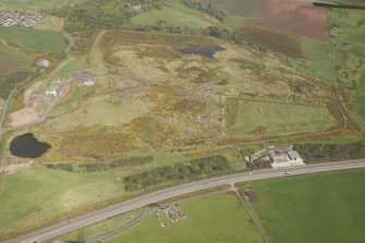 Oblique aerial view of Wester Hatton Sand and Gravel Extraction Site and land fill, looking to the NW.