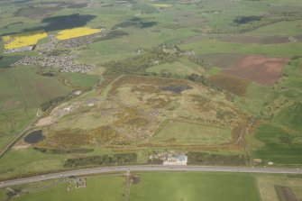 Oblique aerial view of Wester Hatton Sand and Gravel Extraction Site and land fill, looking to the WNW.