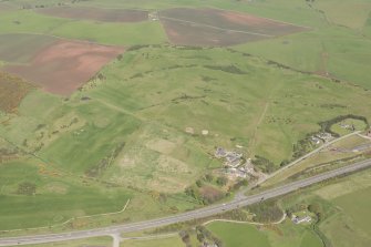 Oblique aerial view of East Abderdeenshire Golf Course, looking to the WNW.