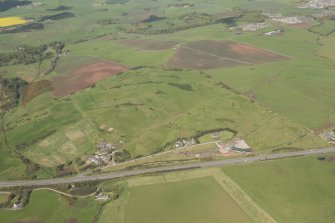 Oblique aerial view of East Abderdeenshire Golf Course, looking to the NW.