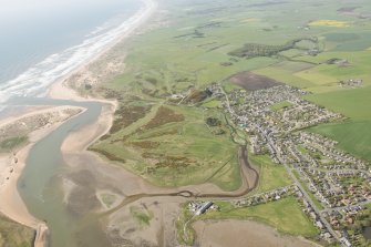 General oblique aerial view of the mouth of the Ythan estuary centred on Newburgh-on-Ythan Golf Course, looking to the S.