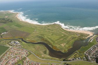 General oblique aerial view of Craigewan Links centred on Peterhead Golf Courses, looking to the NE.